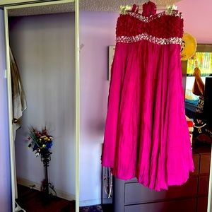 Ladies, fuchsia Dress with a silver trim,with silver beads.